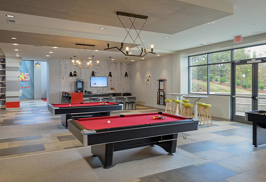 Clubhouse with pool tables and coffee bars