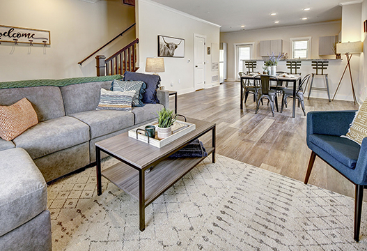 Apartment living room with view of dining area