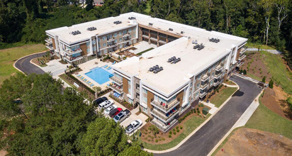 Birds eye view of property and pool